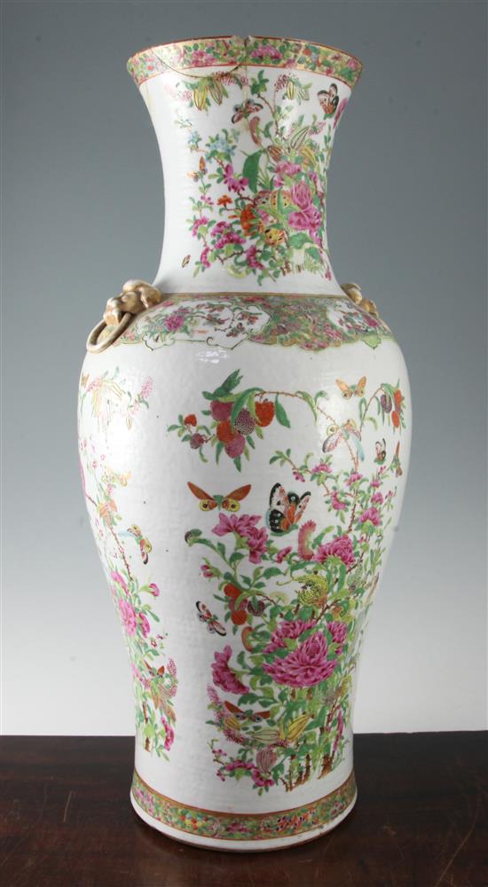 A large Chinese Canton-decorated famille rose baluster vase, Daoguang period (1821-50), 61cm, neck repaired